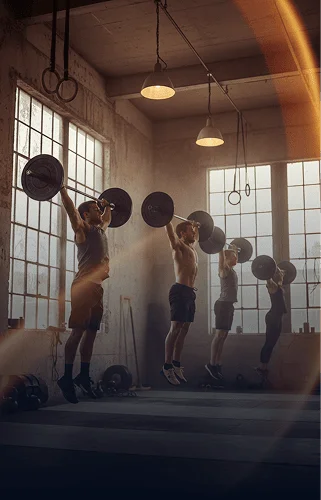 Athletes training in a CrossFit gym